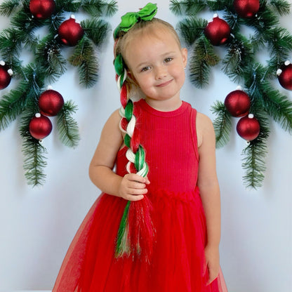 girl wearing candy cane inspired hair colours